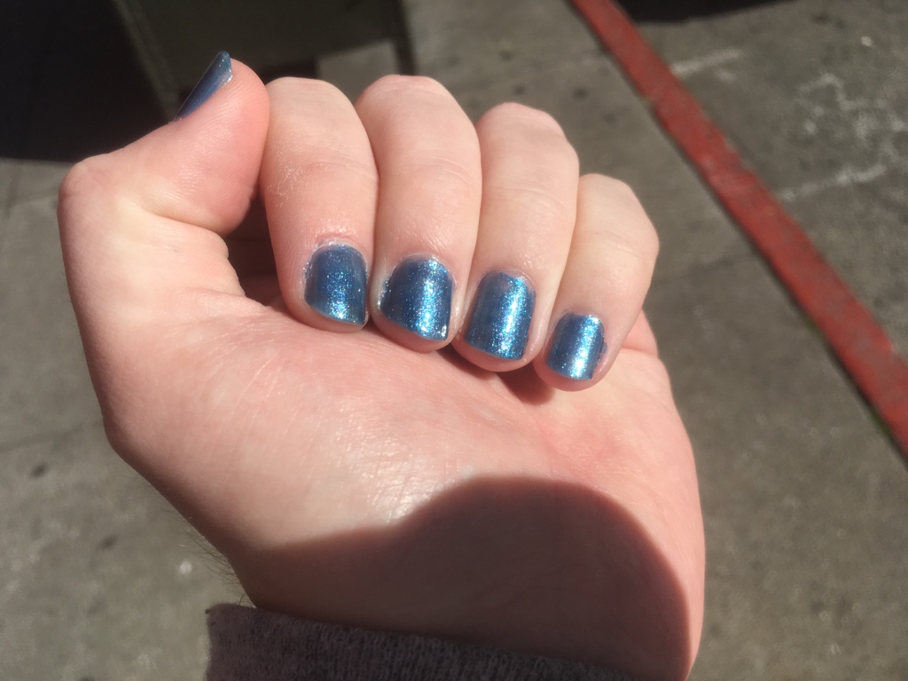 L.A. Colors “Cobalt”, a somewhat grayish teal with a glittery texture.