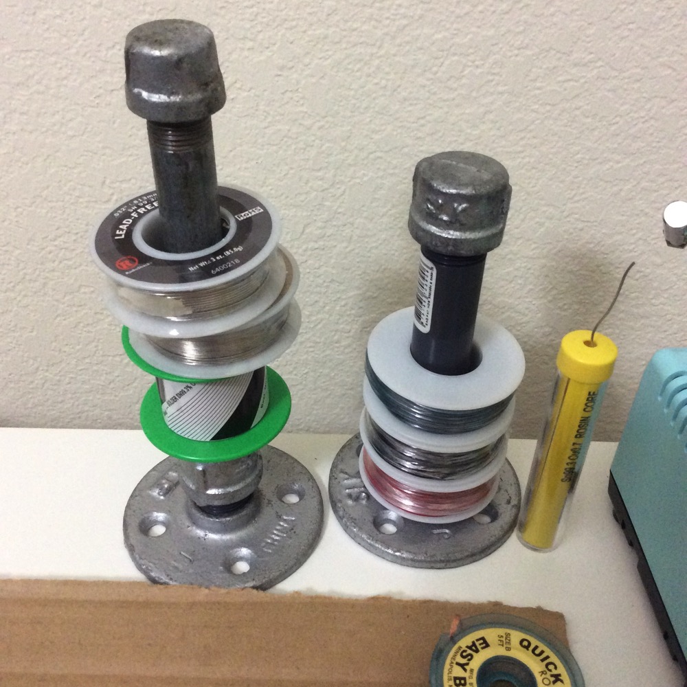 Photo of my solder spindle, along with a prototype of it holding some wire spools.